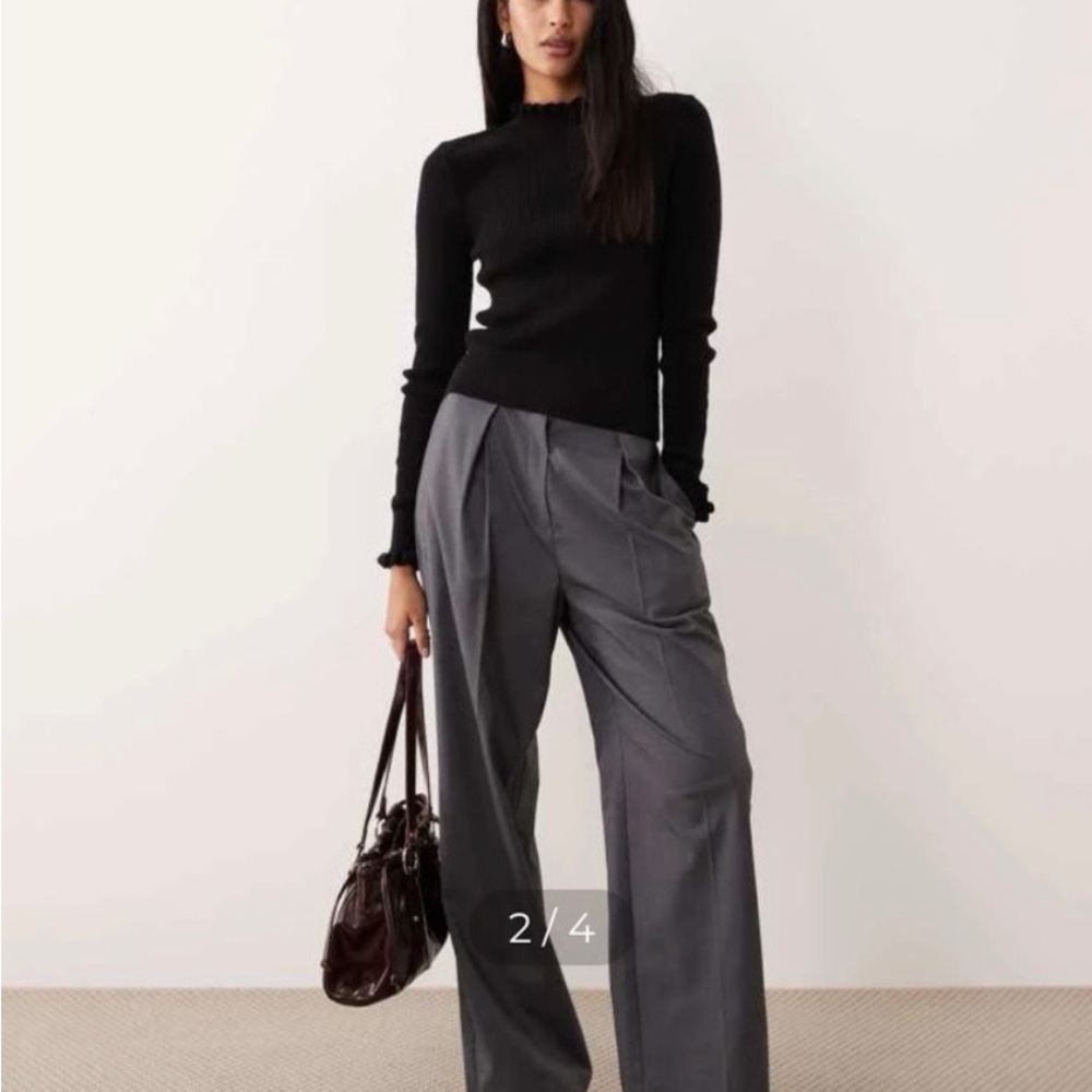 #415  Mango NWOT Beautiful Black Ribbed Turtleneck Sweater with ruffled sleeves